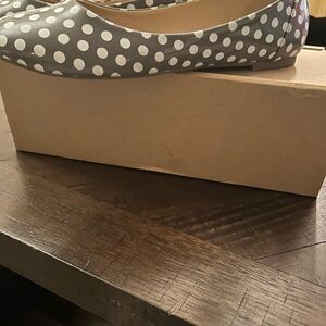Grey and white polka dot flat